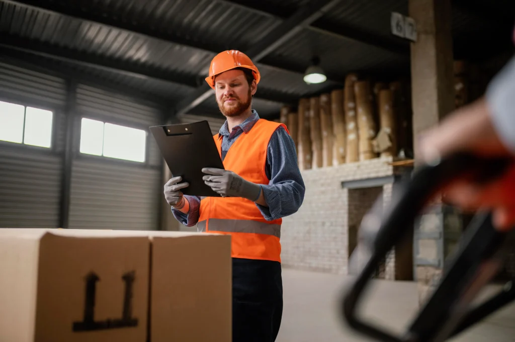 Warehouse worker handling logistics